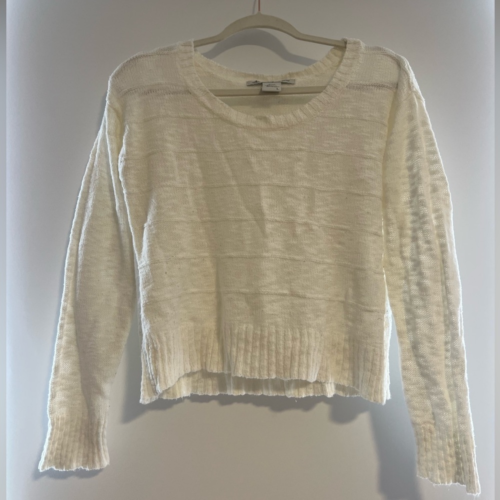 White, Round Neck Sweater. Light cotton material.